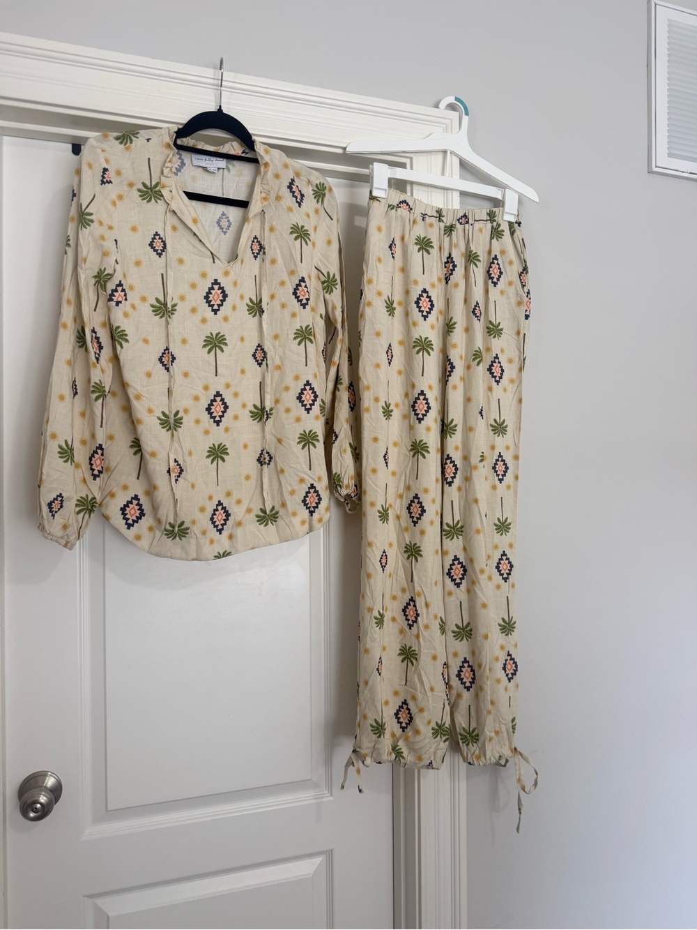 Never Fully Dressed top and bottom set with pockets. Fits true to size.